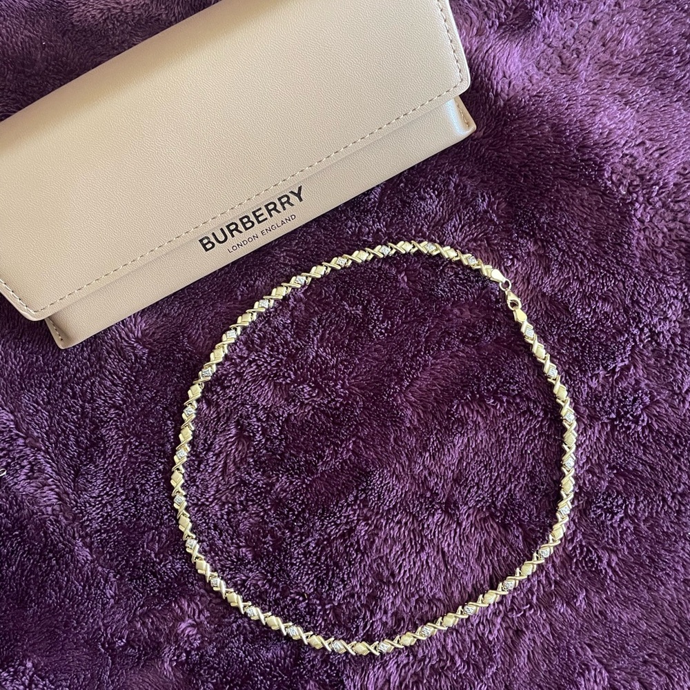 Solid 10k XO necklace.